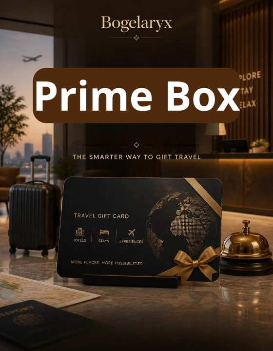 Bogelaryx Prime Box travel gift card on a counter with a suitcase and bell in the background